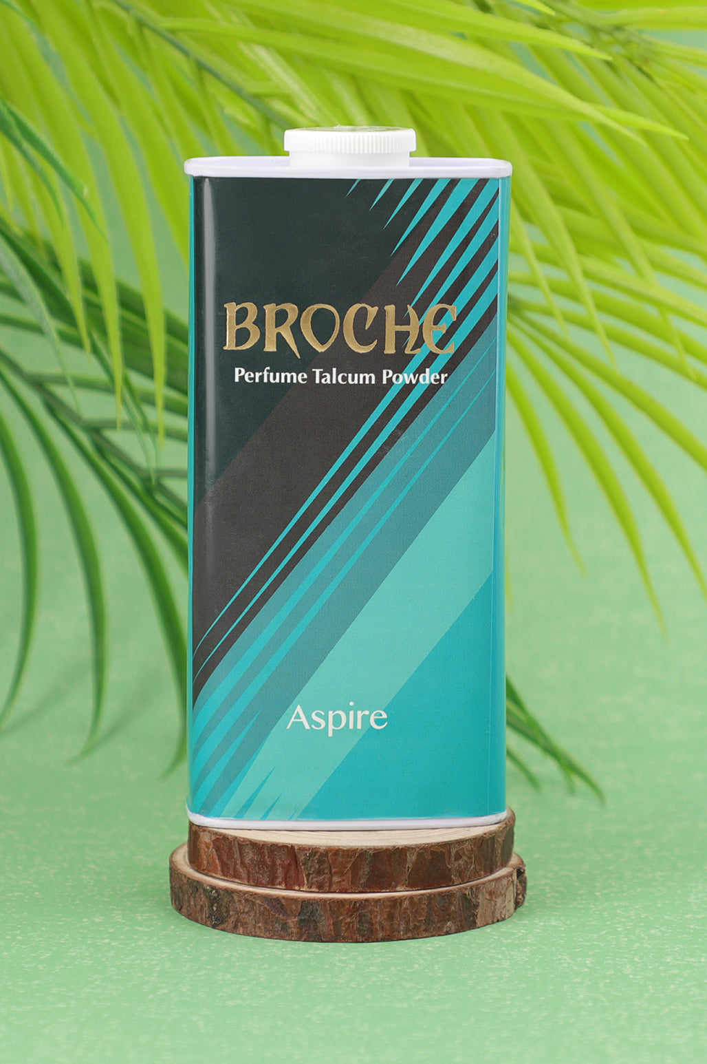 broche-aspire-talcum-powder125gm-aluminum-ontainer-on-wooden-surface-with-natural-background