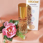 broche-fashion-perfume-30ml-bottle-and-packaging-on-silk-surface-with-beautiful-flower