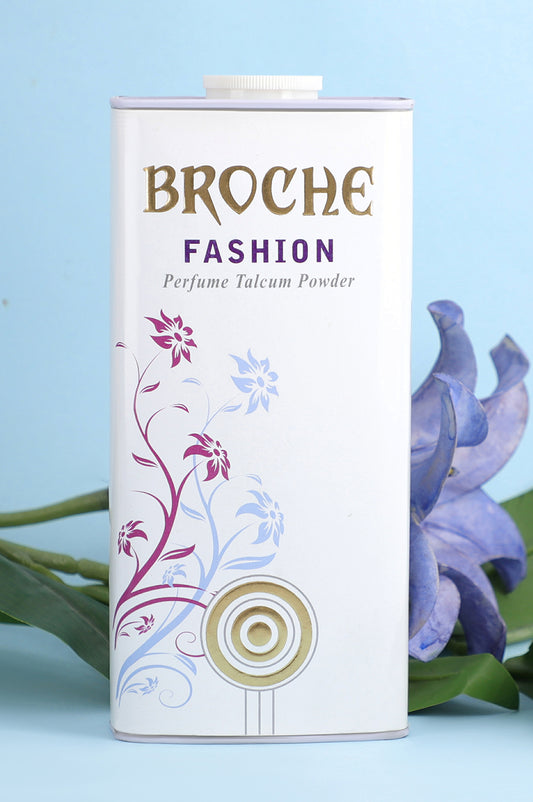 broche-fashion-talcum-powder-aluminum-container-with-flowers-in-the-background