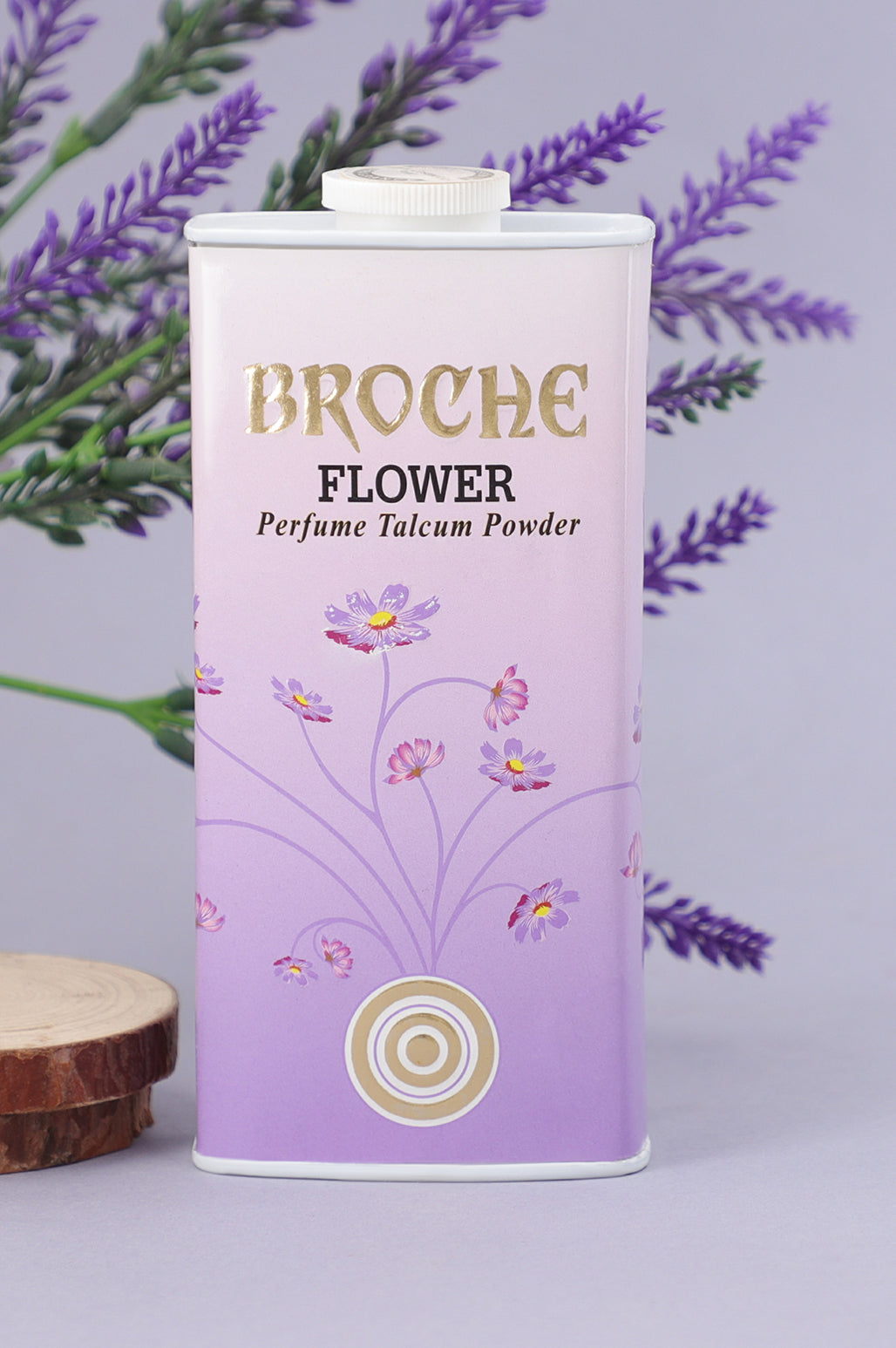 broche-flower-talcum-powder-125gm-aluminum-container-with-flowers-in-the-background