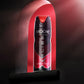 Broche Premium Body Spray Bliss in 200ml Placed on a Window with Red Light Coming from Outside Focusing the Product