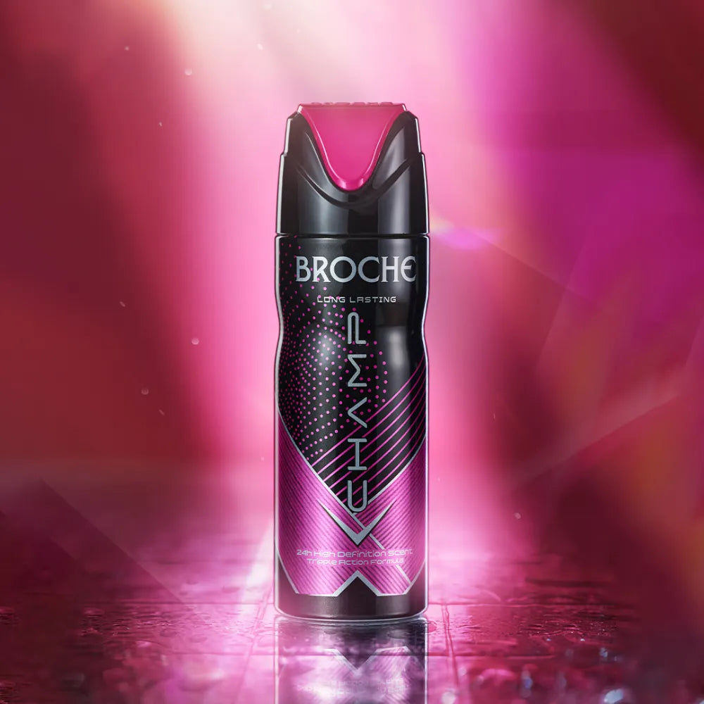 Broche Premium Body Spray Champ in 200ml Placed On A Floor and Lights Coming Out From The Back Of The Product Making It Glow and Focused