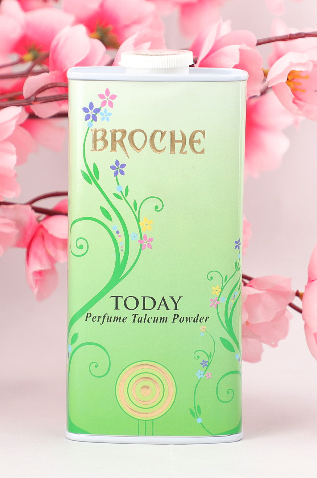 broche-today-talcum-powder-125gm-aluminum-container-with-pink-flowers-in-the-background